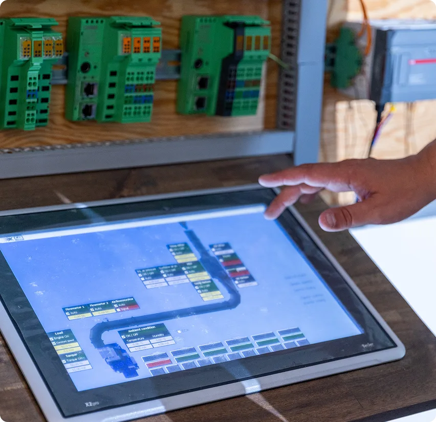 hand interacting with touchscreen. Technical drawing on screen