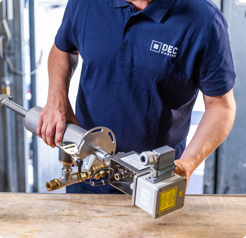 DEC Marine employee handling an industrial product in the warehouse